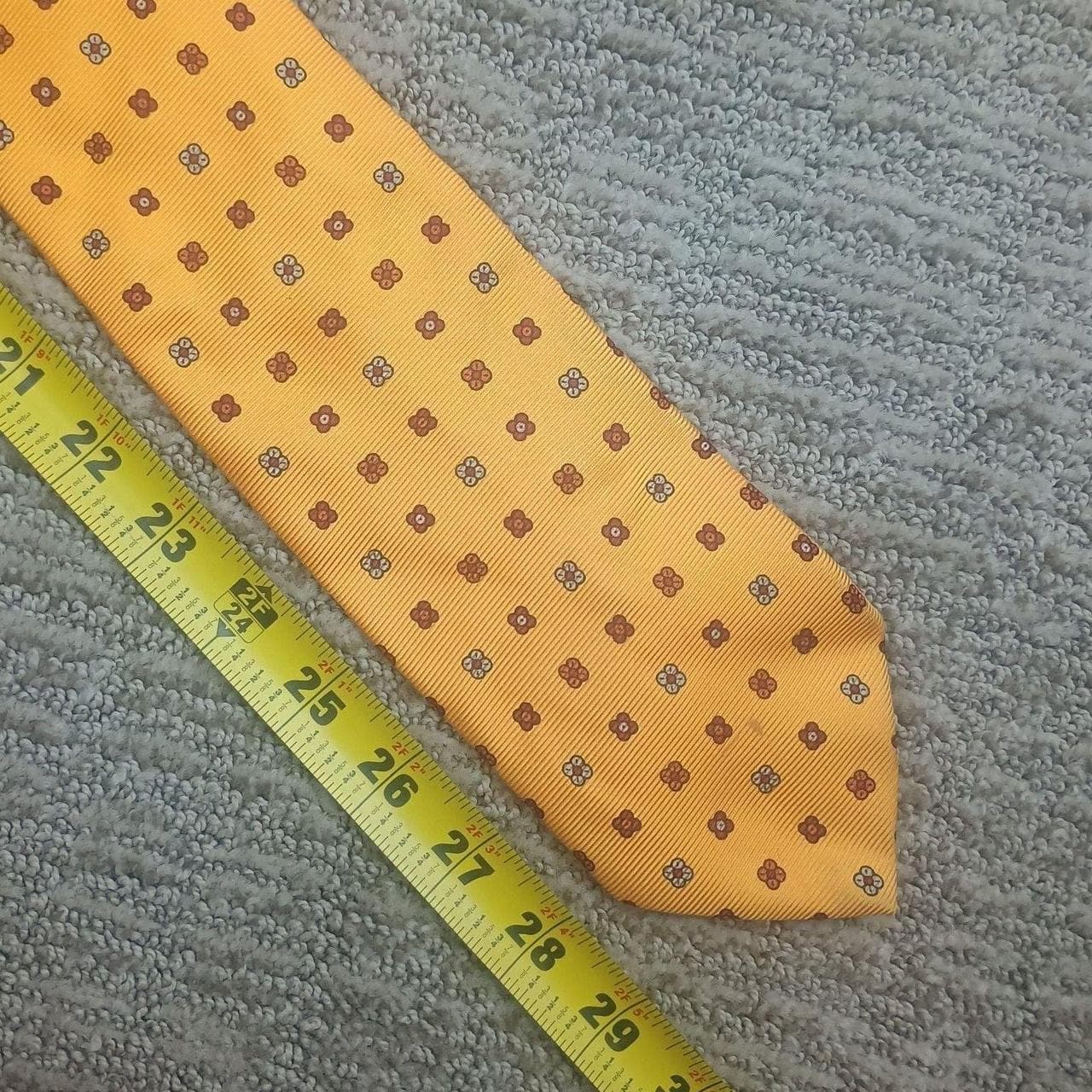 Vintage Brooks Brothers Makers Silk Tie, Yellow Floral Foulard - Made in USA. This classic necktie features a vibrant yellow base with a sophisticated repeating floral foulard pattern in brown and white. Handcrafted from premium 100% silk. - Thumbnail 5