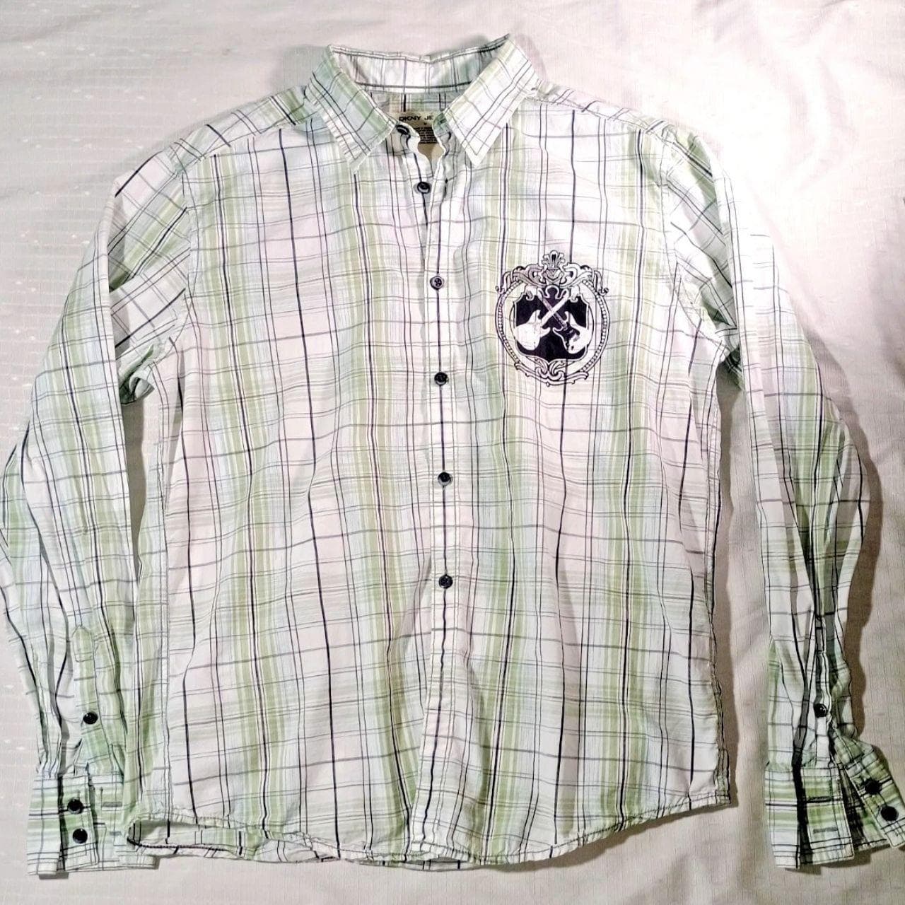 The DKNY Jeans Rock & Roll Button Down Plaid Shirt in Size Medium is a stylish and comfortable addition to any casual wardrobe. - Thumbnail 4