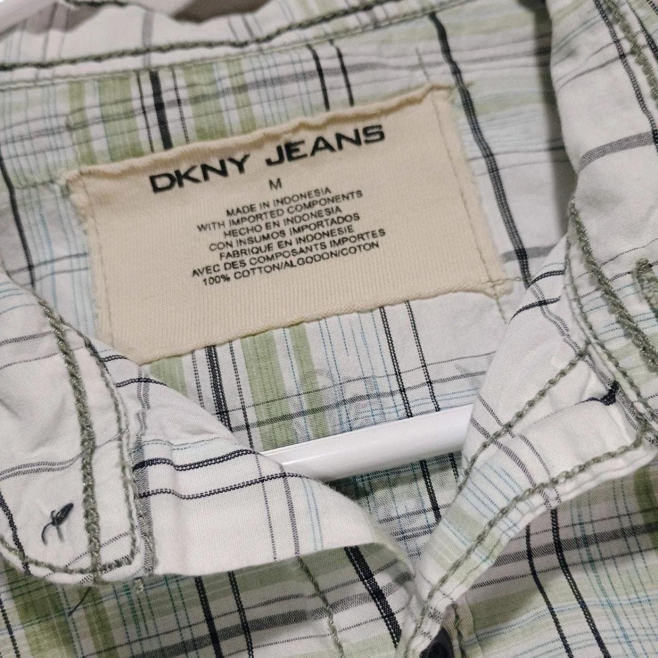 The DKNY Jeans Rock & Roll Button Down Plaid Shirt in Size Medium is a stylish and comfortable addition to any casual wardrobe. - Thumbnail 7