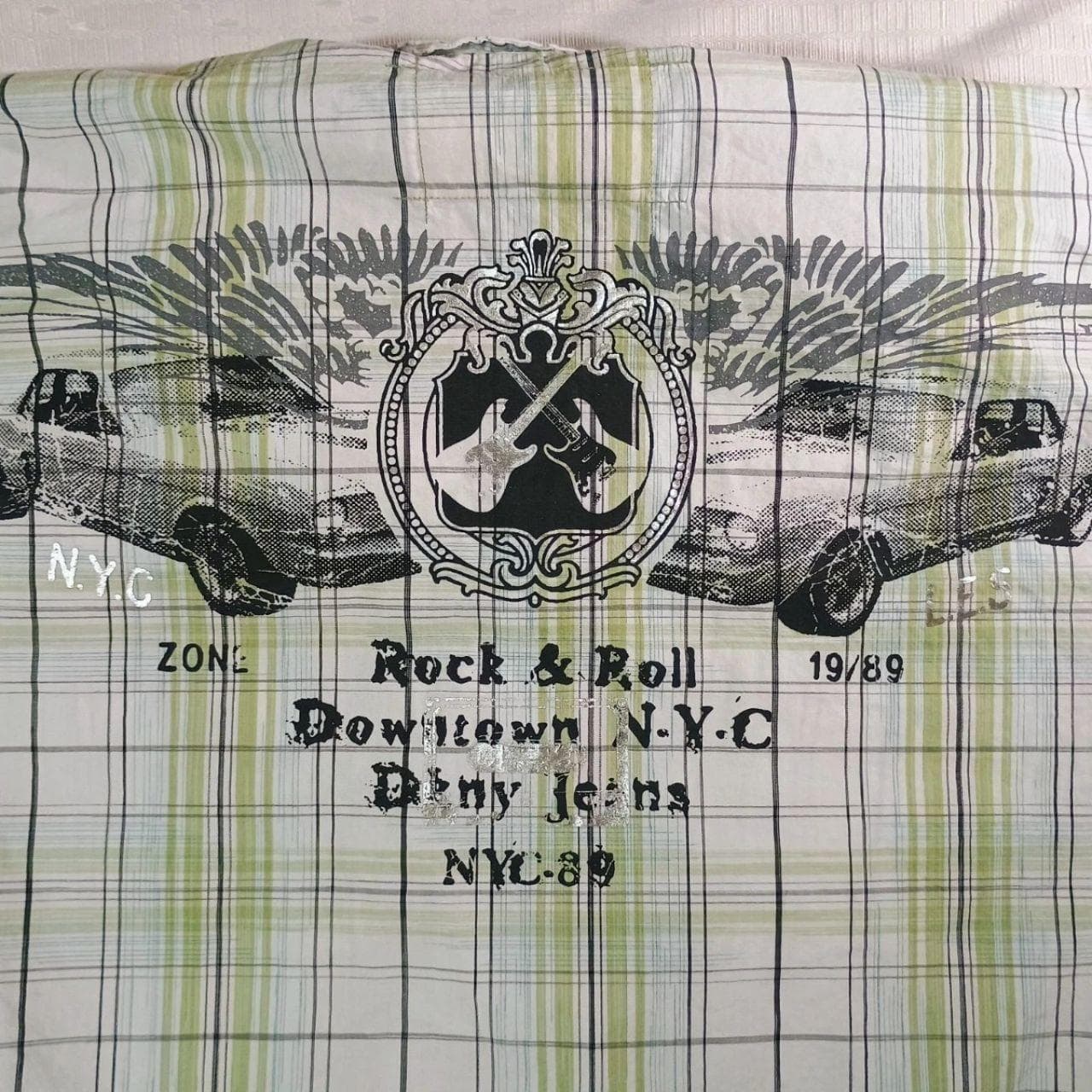 The DKNY Jeans Rock & Roll Button Down Plaid Shirt in Size Medium is a stylish and comfortable addition to any casual wardrobe. - Thumbnail 3
