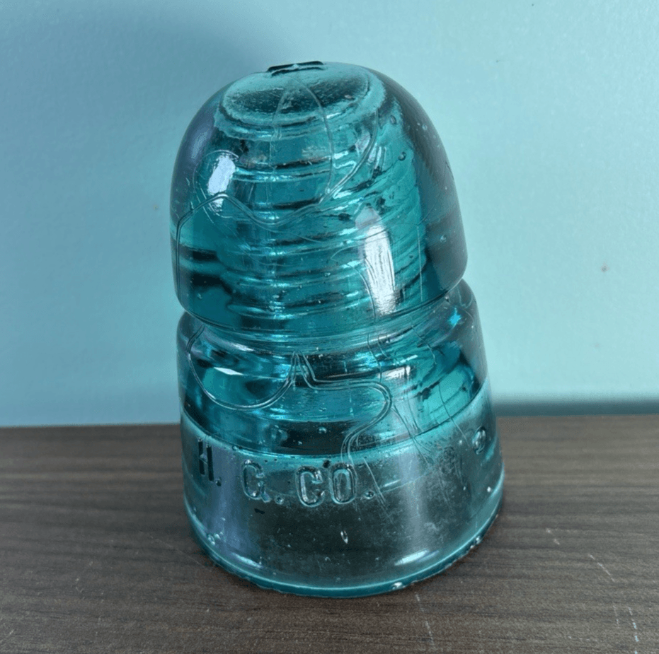 Antique H.G.CO. Aqua Glass Telegraph Insulator Big Bubbles H mark on top Blue