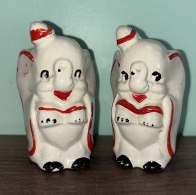 Pair of vintage 1950s Disney Dumbo ceramic salt and pepper shakers With Hat