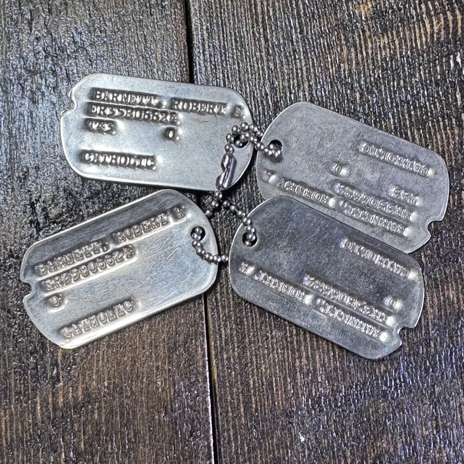 Set Of 4 WWII US Catholic Robert A Barnett soldier ID dog tags Military Notched