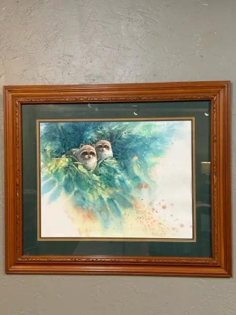 Raccoons in Foliage signed by Robert Carver in Oak Frame