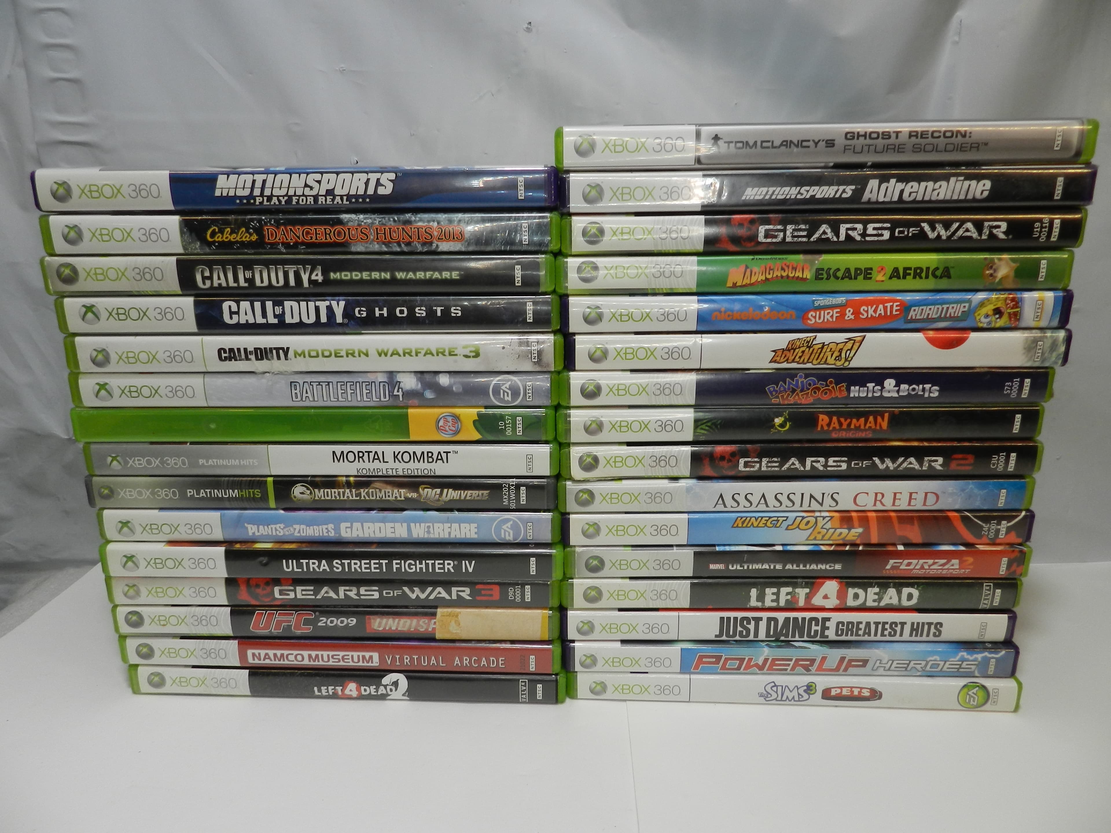 32 XBox 360 Games Call Duty Rayman Gears War Plant Zombies Banjo & more (O70M)