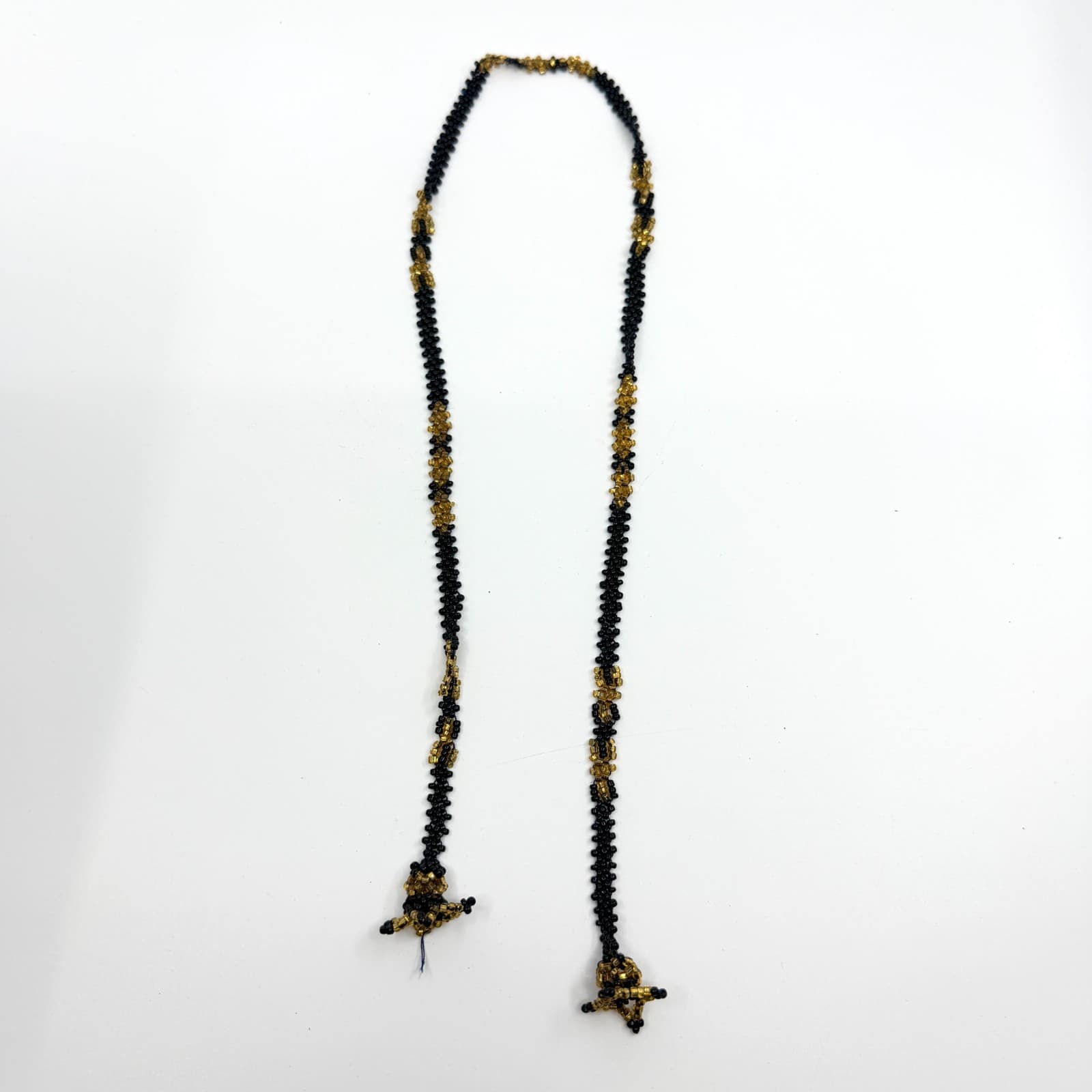 VTG Y2K Hand Woven Seed Bead Lariat Necklace Black Gold Tone Star Tassel Boho