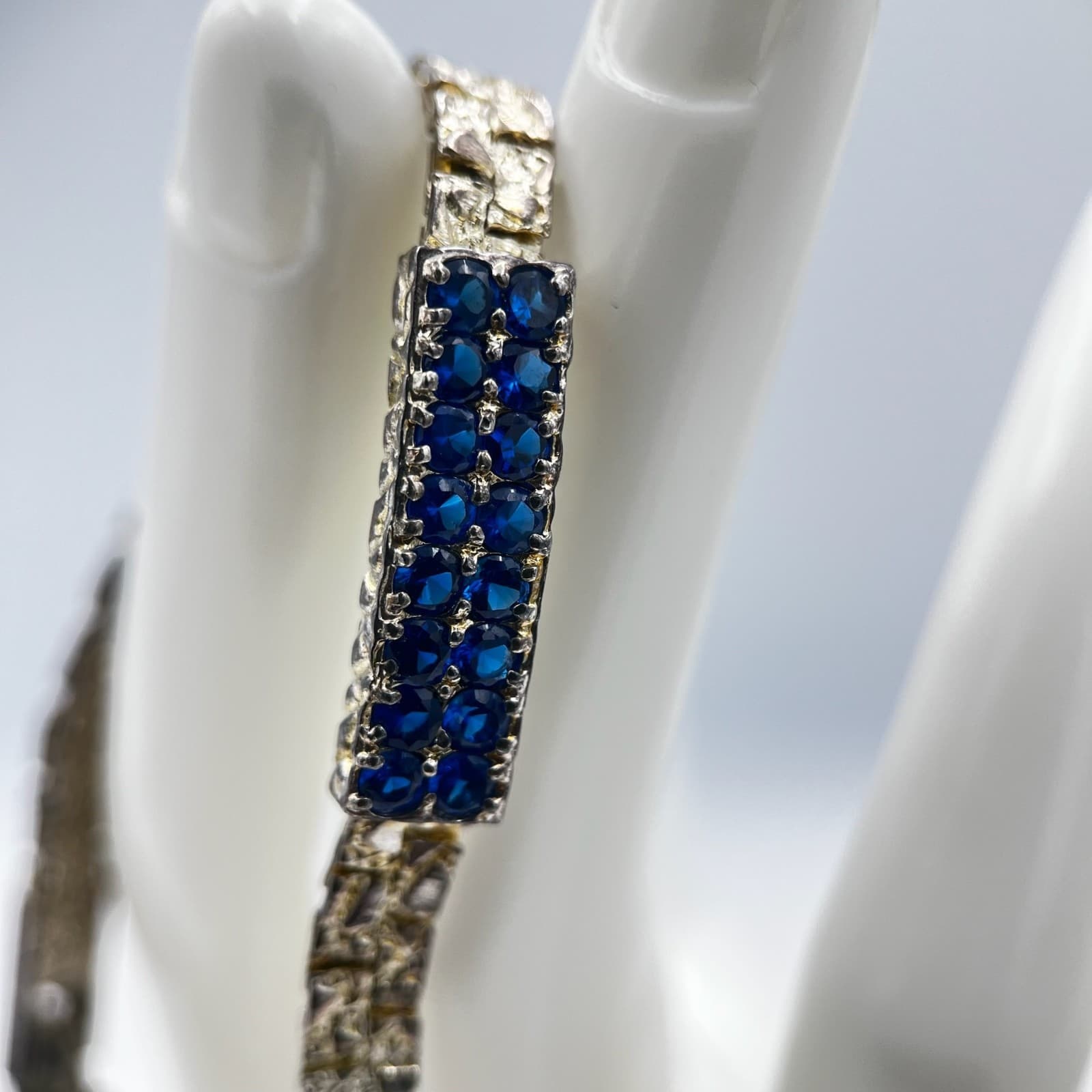 Vintage Sapphire Blue Rhinestone Bracelet – Textured Gold Tone Link 7"