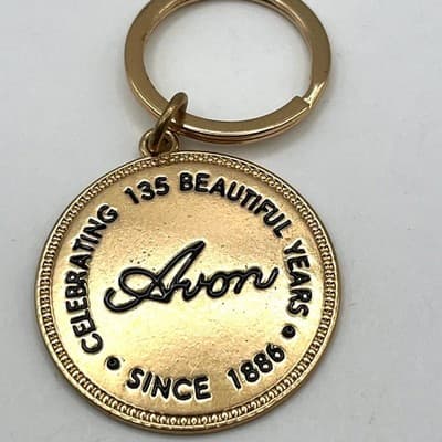 Vintage Avon 135th Anniversary Keychain CPC House Logo Gold Tone Sign of Quality