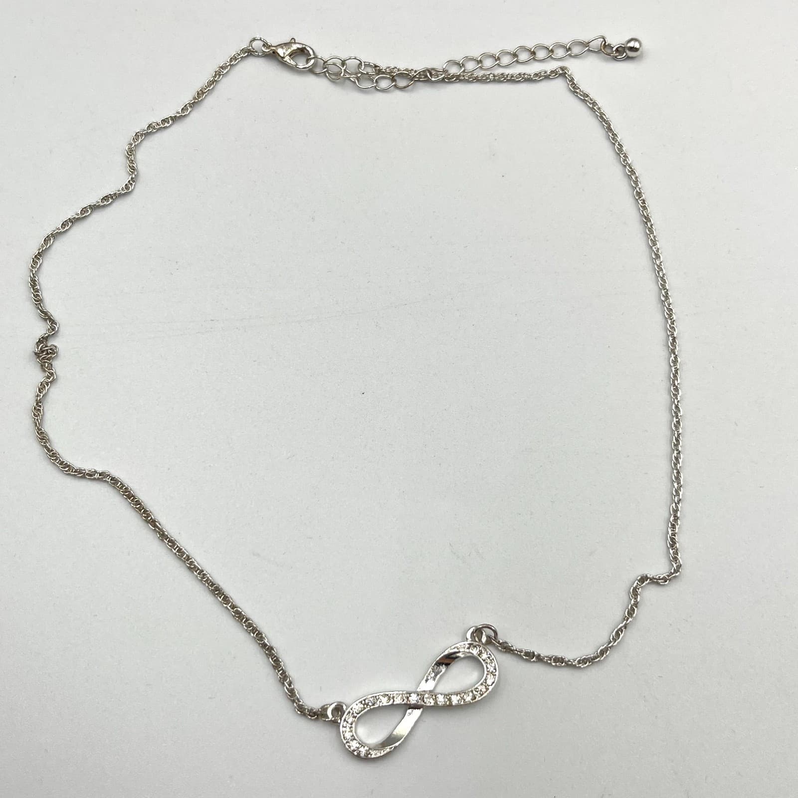 VTG Elegant Silver Tone Infinity Pendant Necklace Clear Rhinestone Minimalist - Thumbnail 3