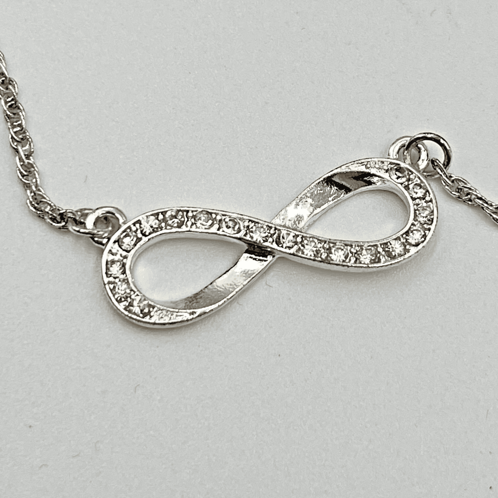 VTG Elegant Silver Tone Infinity Pendant Necklace Clear Rhinestone Minimalist