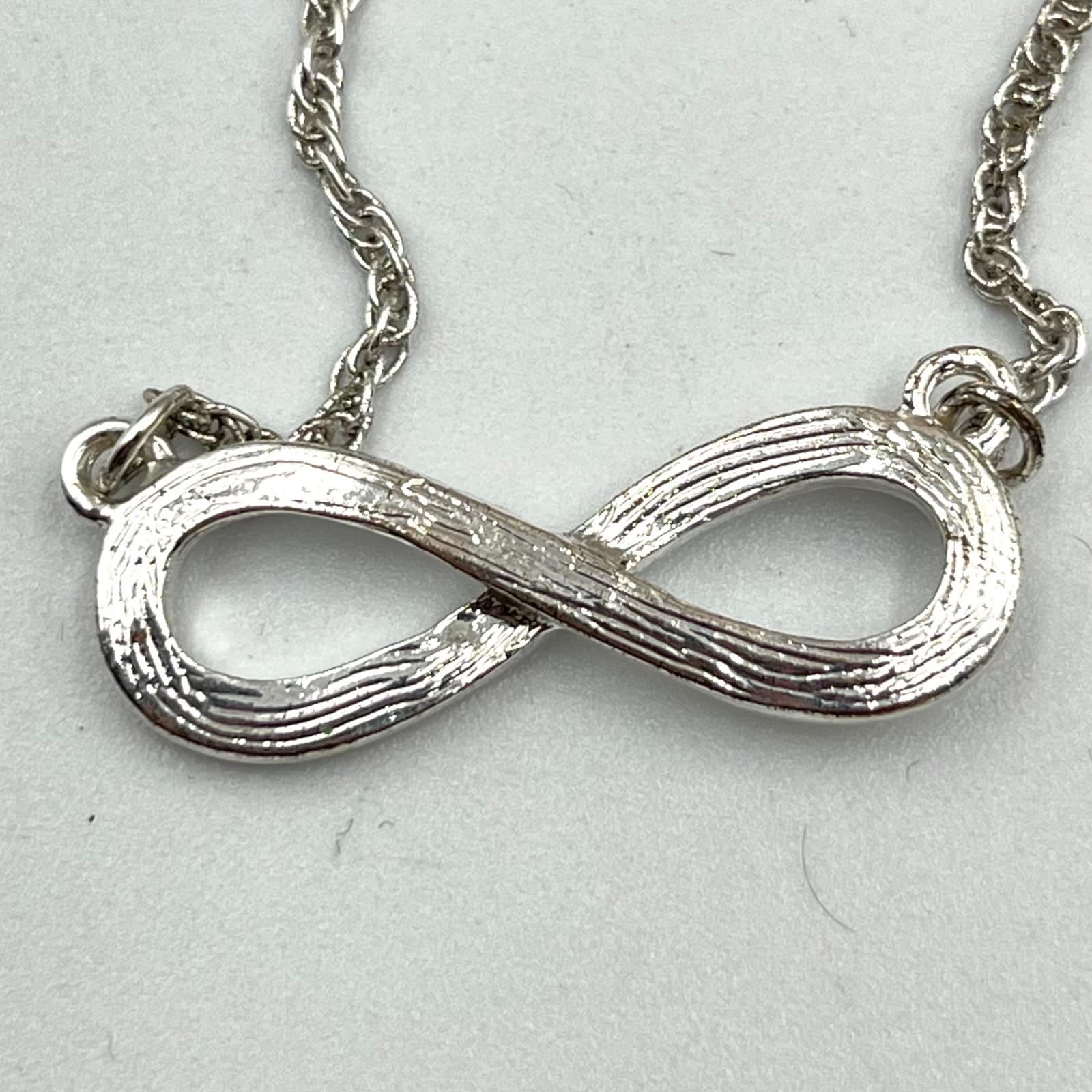 VTG Elegant Silver Tone Infinity Pendant Necklace Clear Rhinestone Minimalist - Thumbnail 5