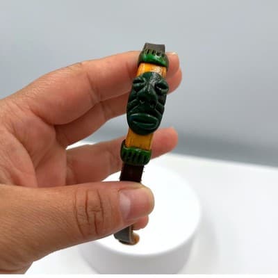 Vintage Carved Tribal Mask Bracelet Leather Cord Adjustable Brown Green Yellow