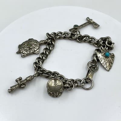 VTG Silver Tone Charm Bracelet Turtle Cross Drum Arrow Turquoise Accent Chunky