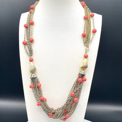 Vintage Multi-strand gold-tone chain necklace with red beads and tassel accents