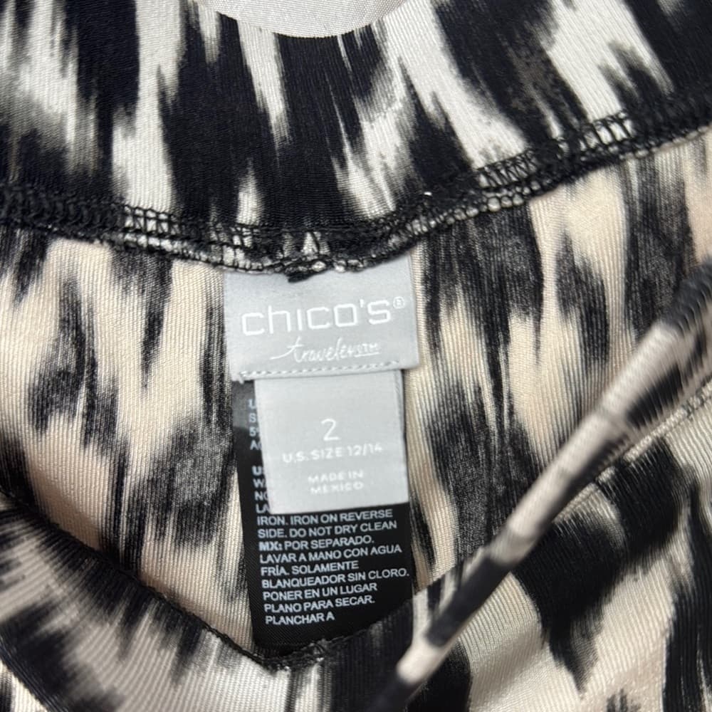 109. Chico’s Travelers Black & White Abstract Wide Leg Crop Pants Size 2 (12/14)