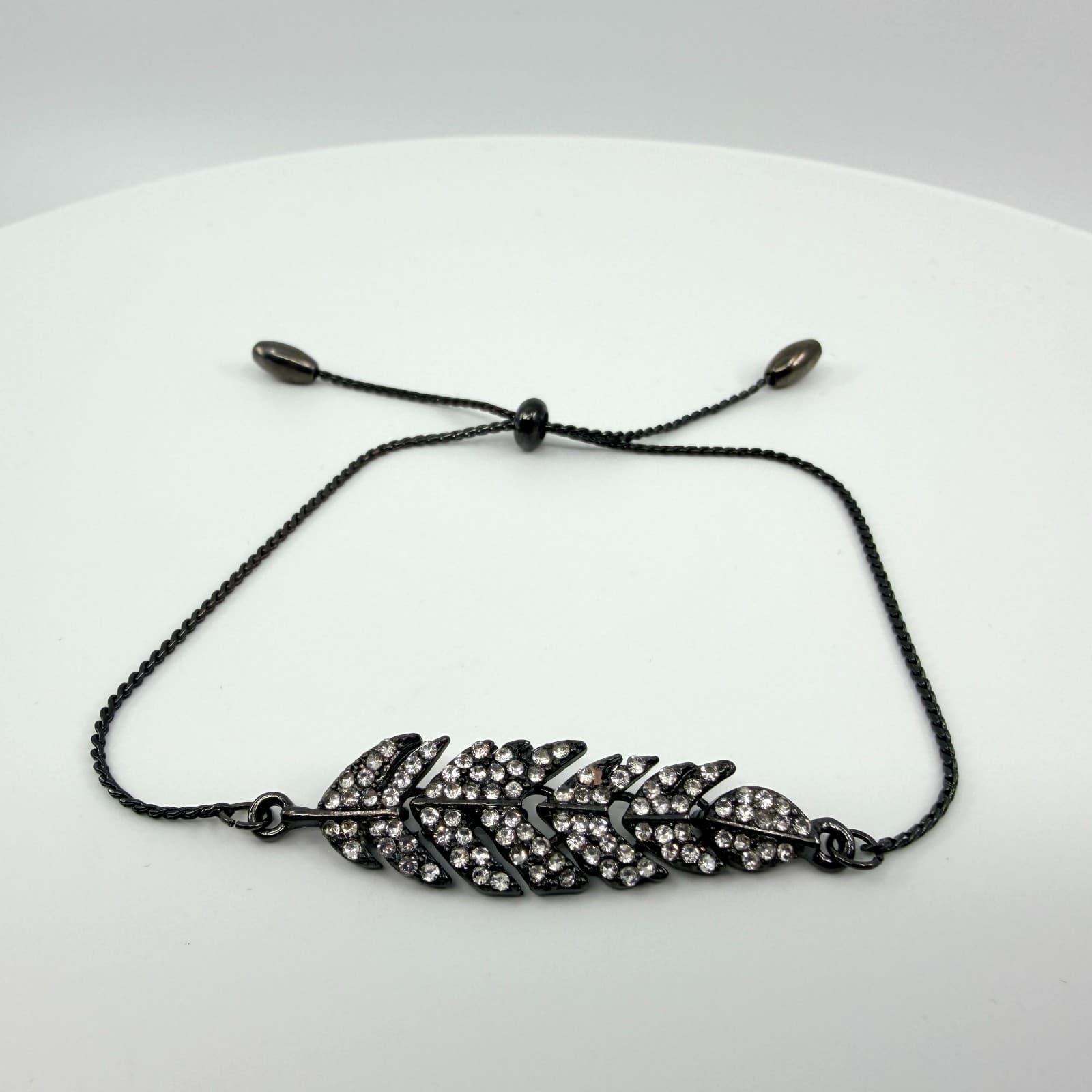 Vintage Gunmetal Tone Feather Bracelet Rhinestone Accent Adjustable Slider Bolo