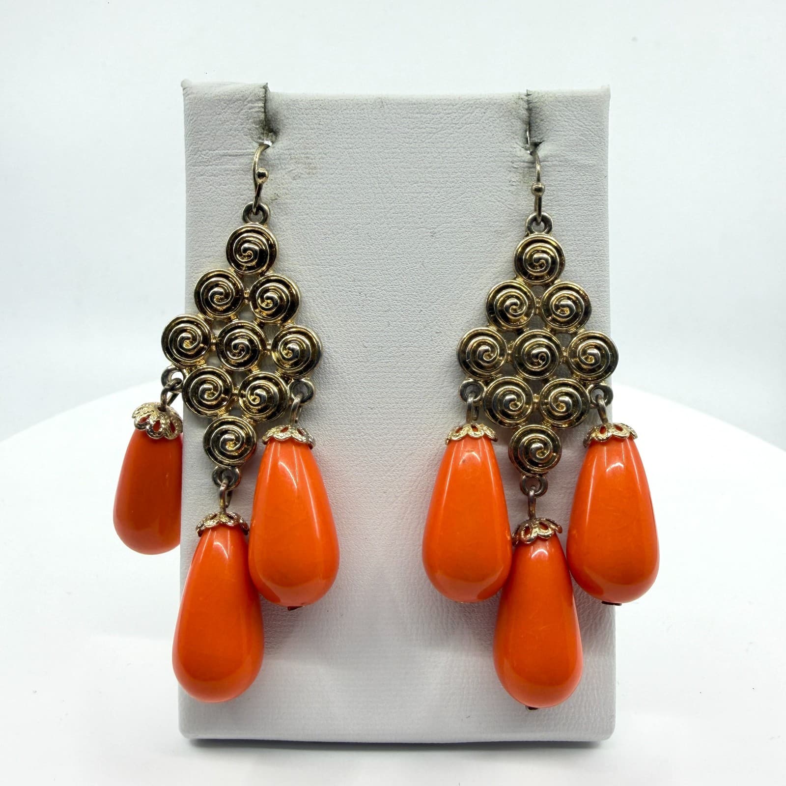 Gold Tone Spiral Statement Dangle Earrings With Bright Orange Teardrop Accents