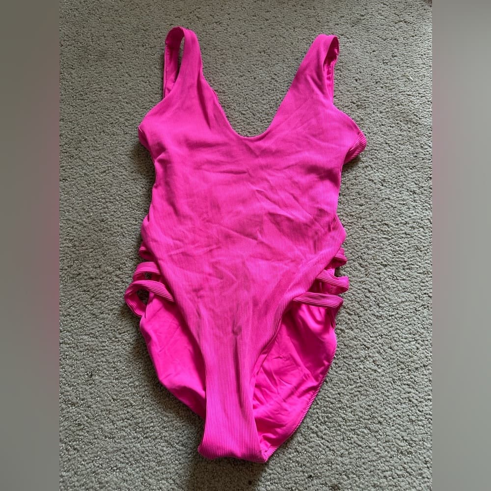 Becca Fine Line plunge one piece swimsuit hot pink