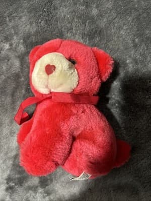 A vintage red plush teddy bear with a heart nose and ribbon. - Thumbnail 5