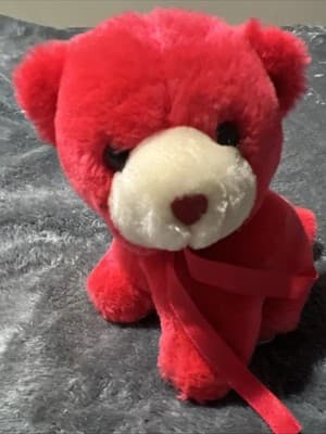 A vintage red plush teddy bear with a heart nose and ribbon. - Thumbnail 2