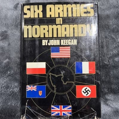 A historical book titled "Six Armies in Normandy" by John Keegan. VG