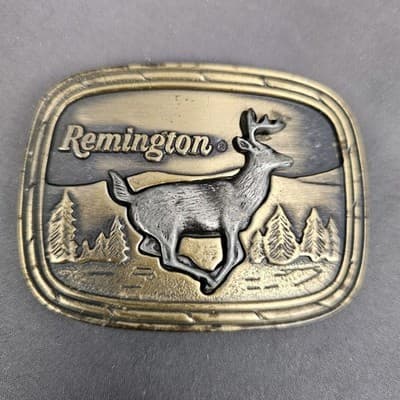 Vintage Belt Buckle Remington Arms Logo Running White Tailed Deer 1979 Sid Bell
