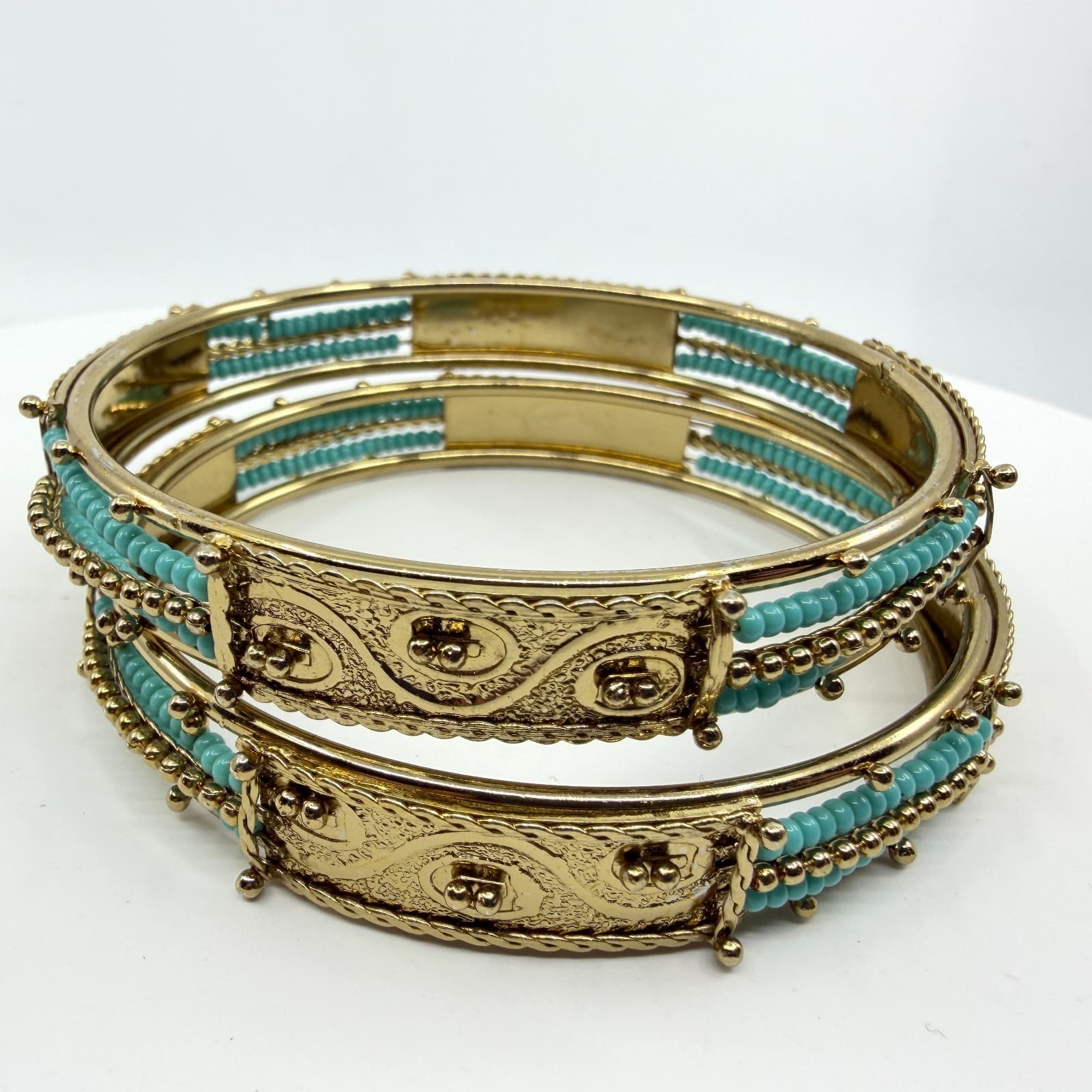 Ornate Gold Tone Filigree Bangle Bracelet Set with Teal Bead Detail Statement