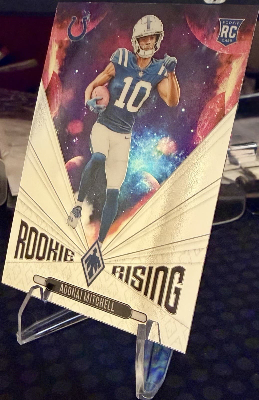 2024 Panini Phoenix Adonai Mitchell Rookie Rising Galaxy Silver #RR-AML - Thumbnail 3