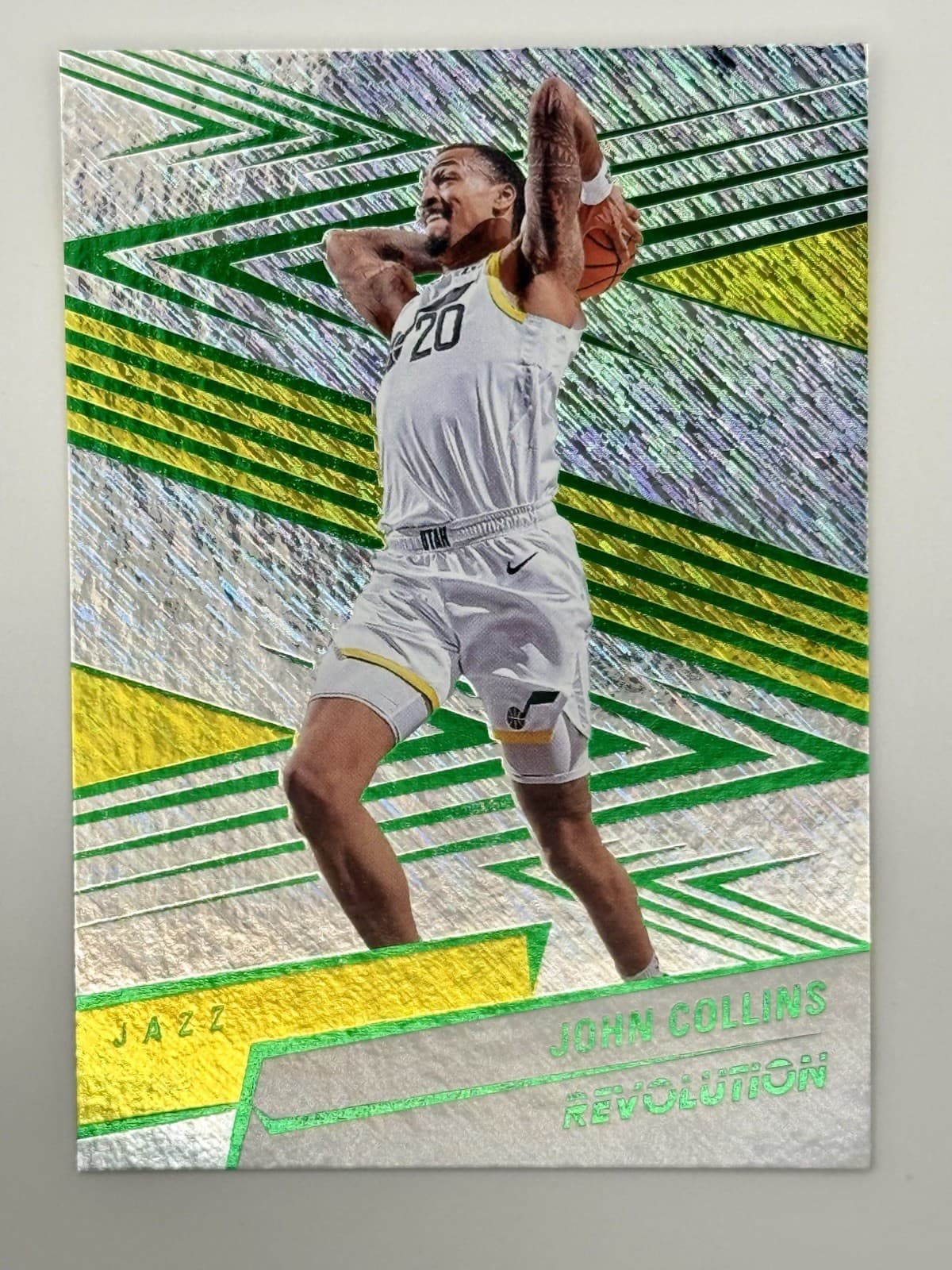 2024-25 Panini Revolution John Collins #36 Green Yellow Refactor Storm #/149