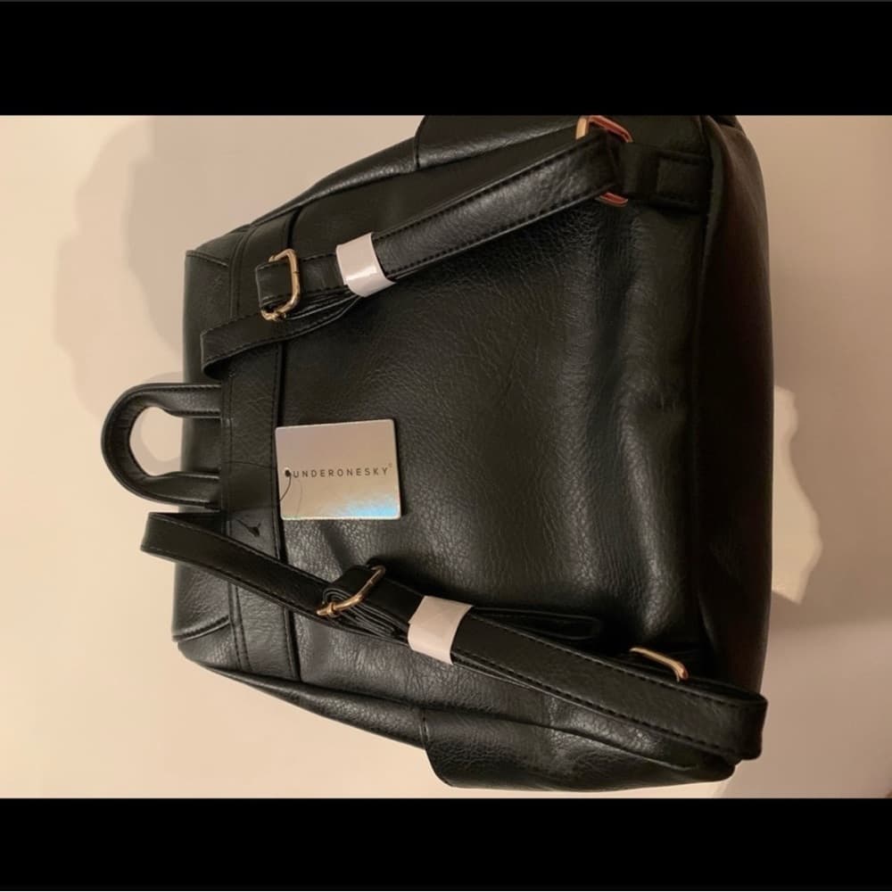Woman’s faux leather backpack - Thumbnail 2