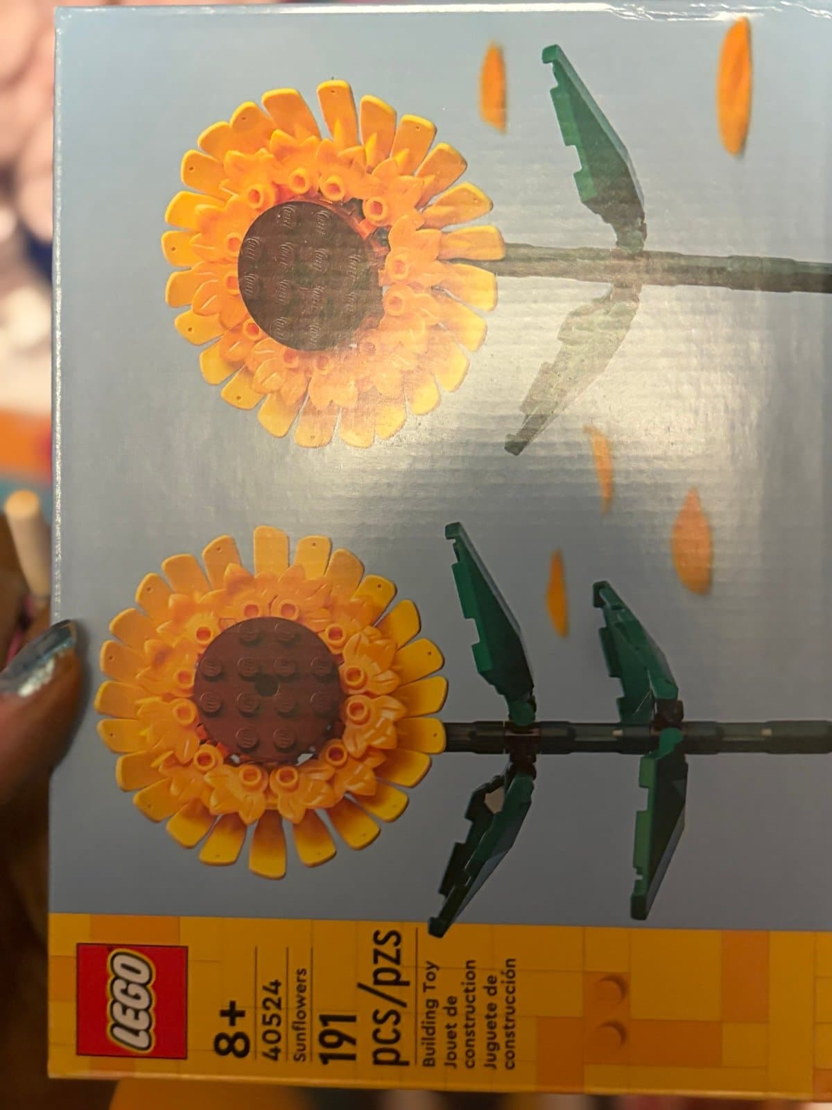 2 Lego sets the Sunflowers Set and the Lotus Flowers Set