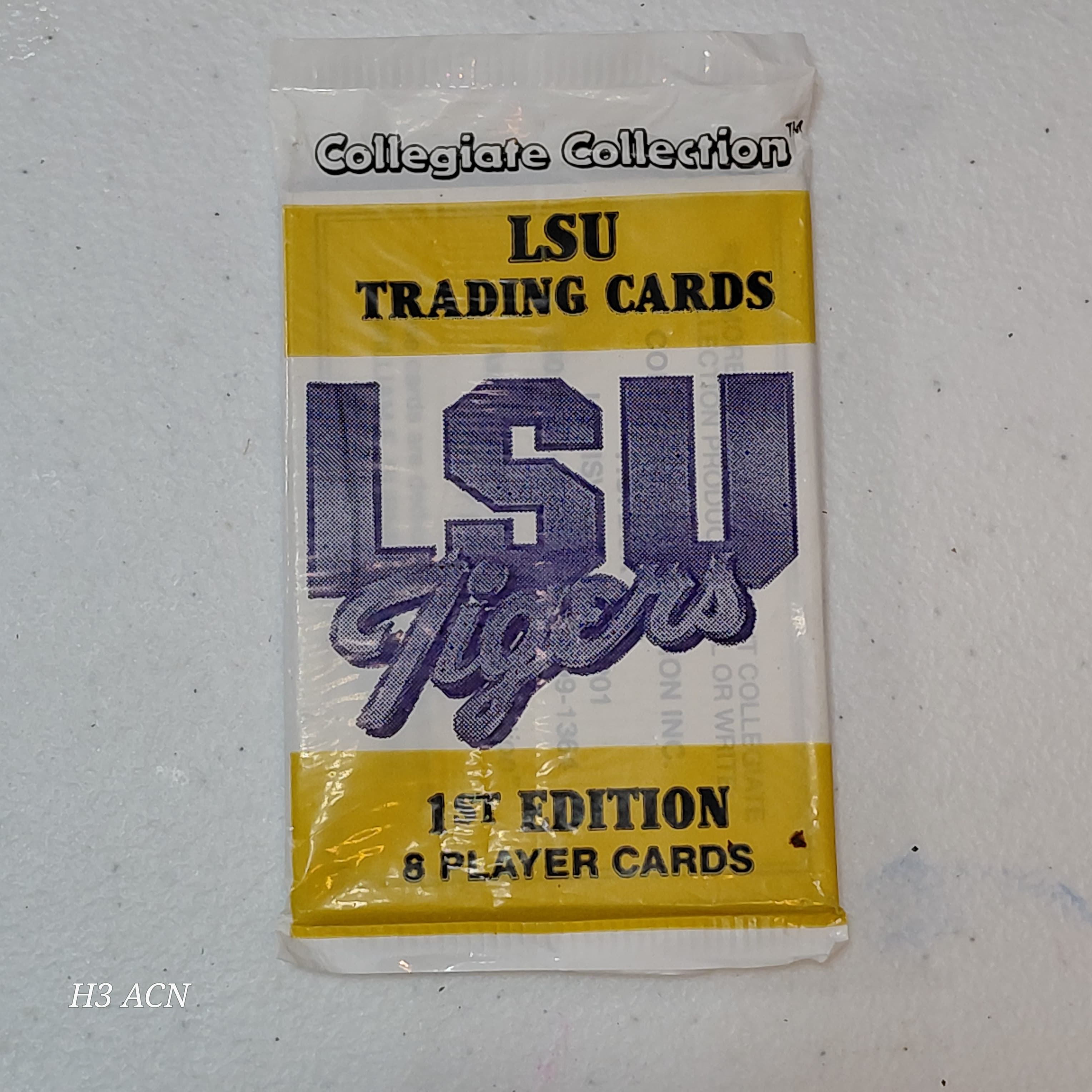 Sealed pack of 1990 Collegiate Collection LSU Tigers 1st Edition Trading Cards - Thumbnail 6