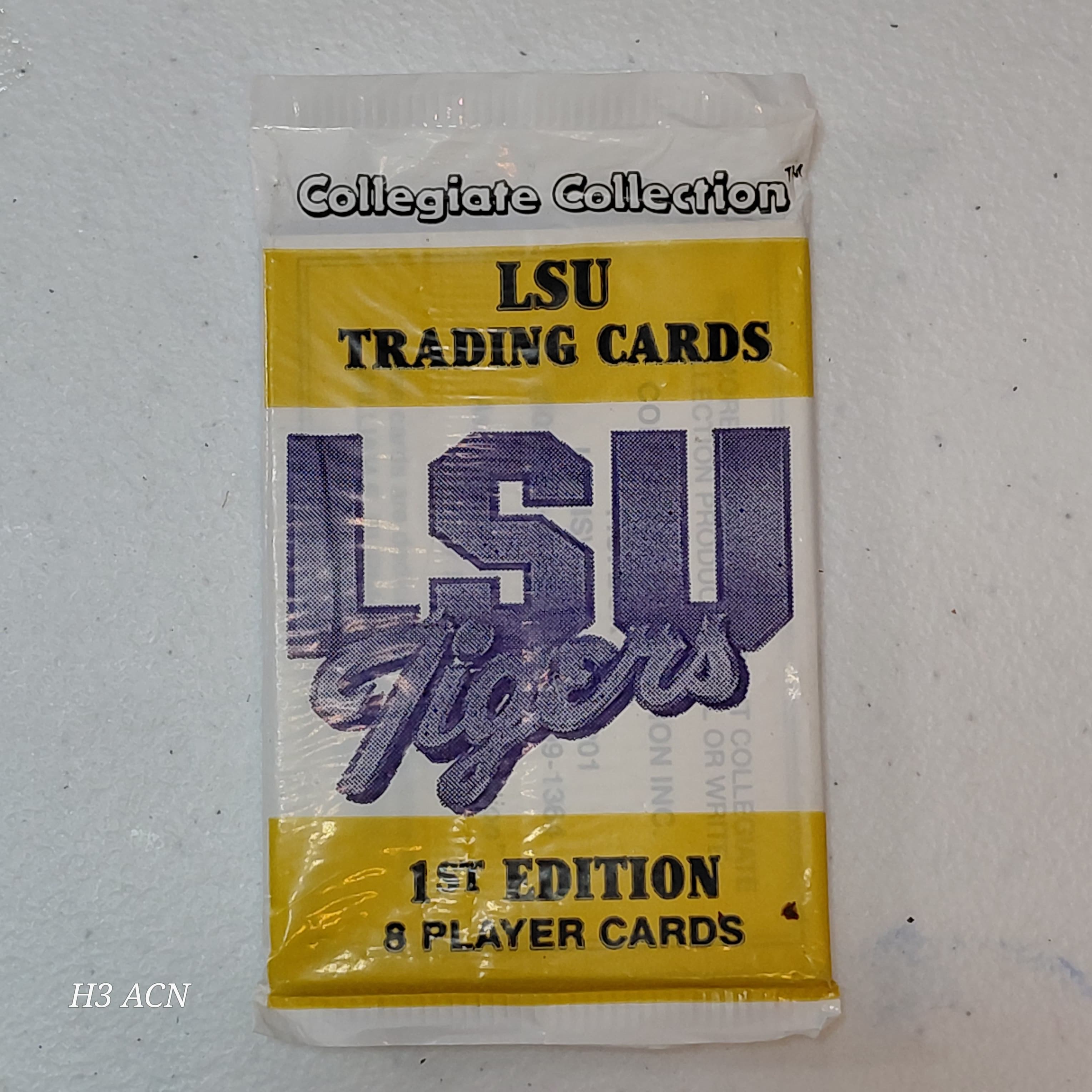 Sealed pack of 1990 Collegiate Collection LSU Tigers 1st Edition Trading Cards - Thumbnail 7