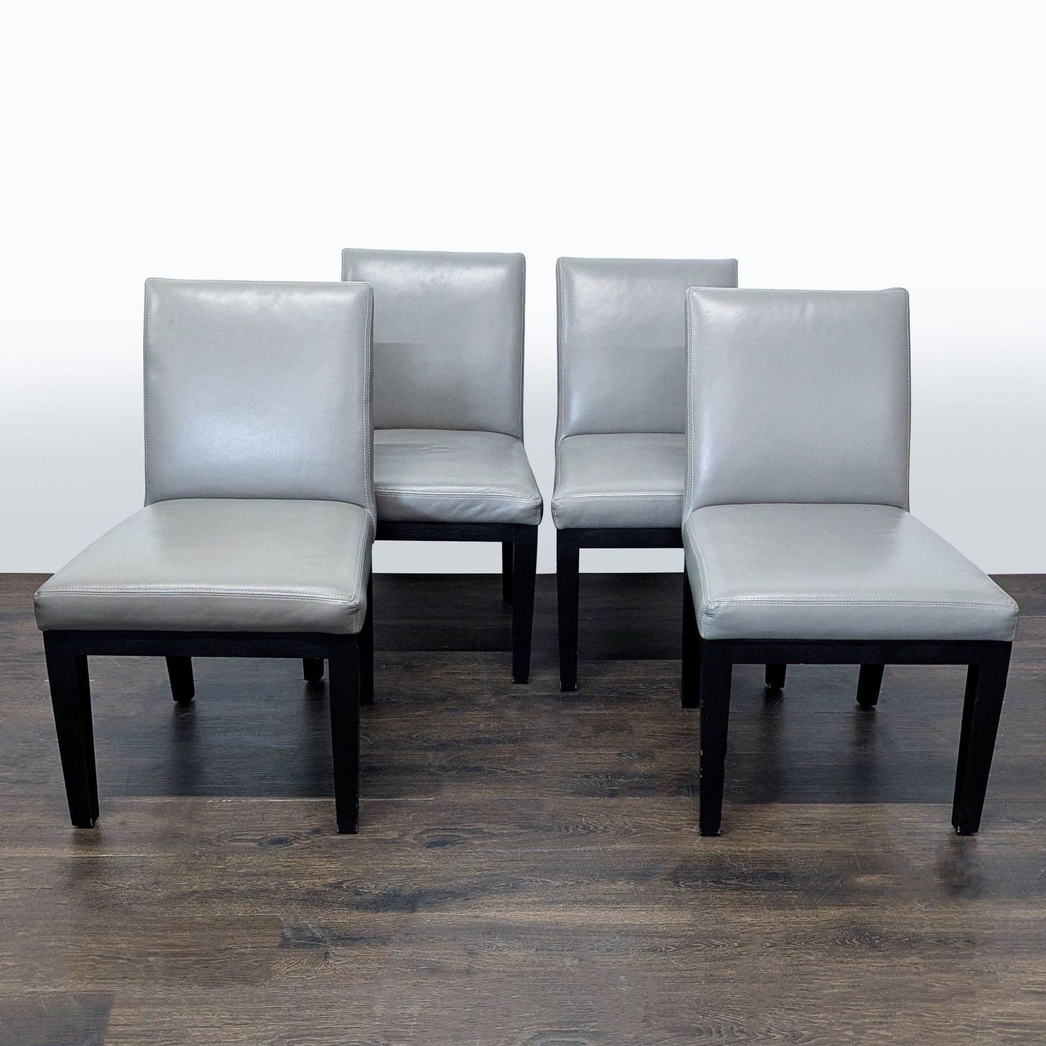 Set of Four Leather Dining Chairs with Wood Frame