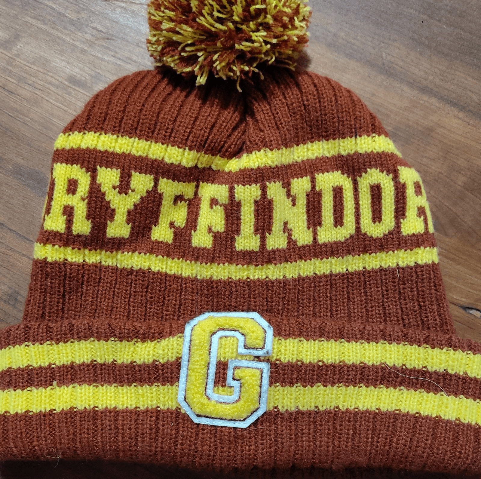 Wizarding World Harry Potter Gryffindor Knit Pom Beanie Hat w/ G Patch