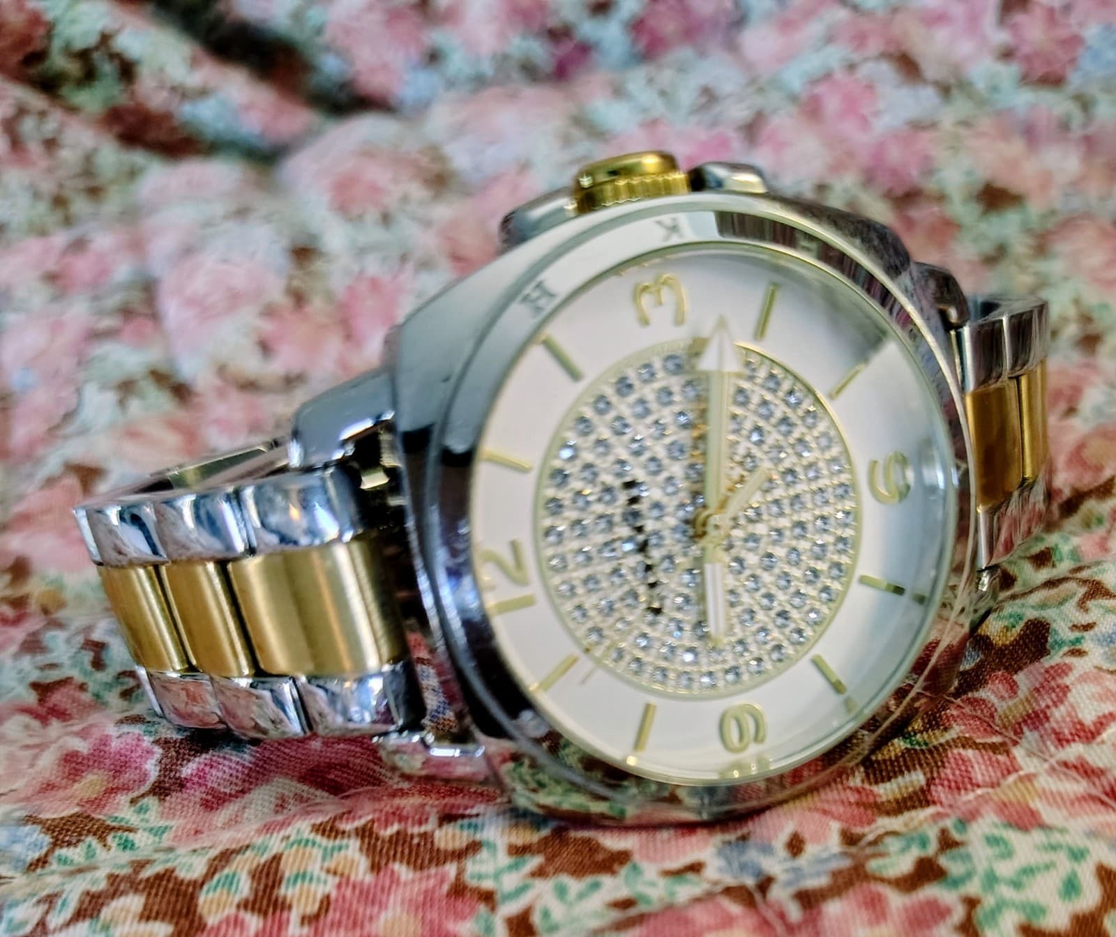 Coach Boyfriend Small watch featuring a two-tone silver and gold stainless steel