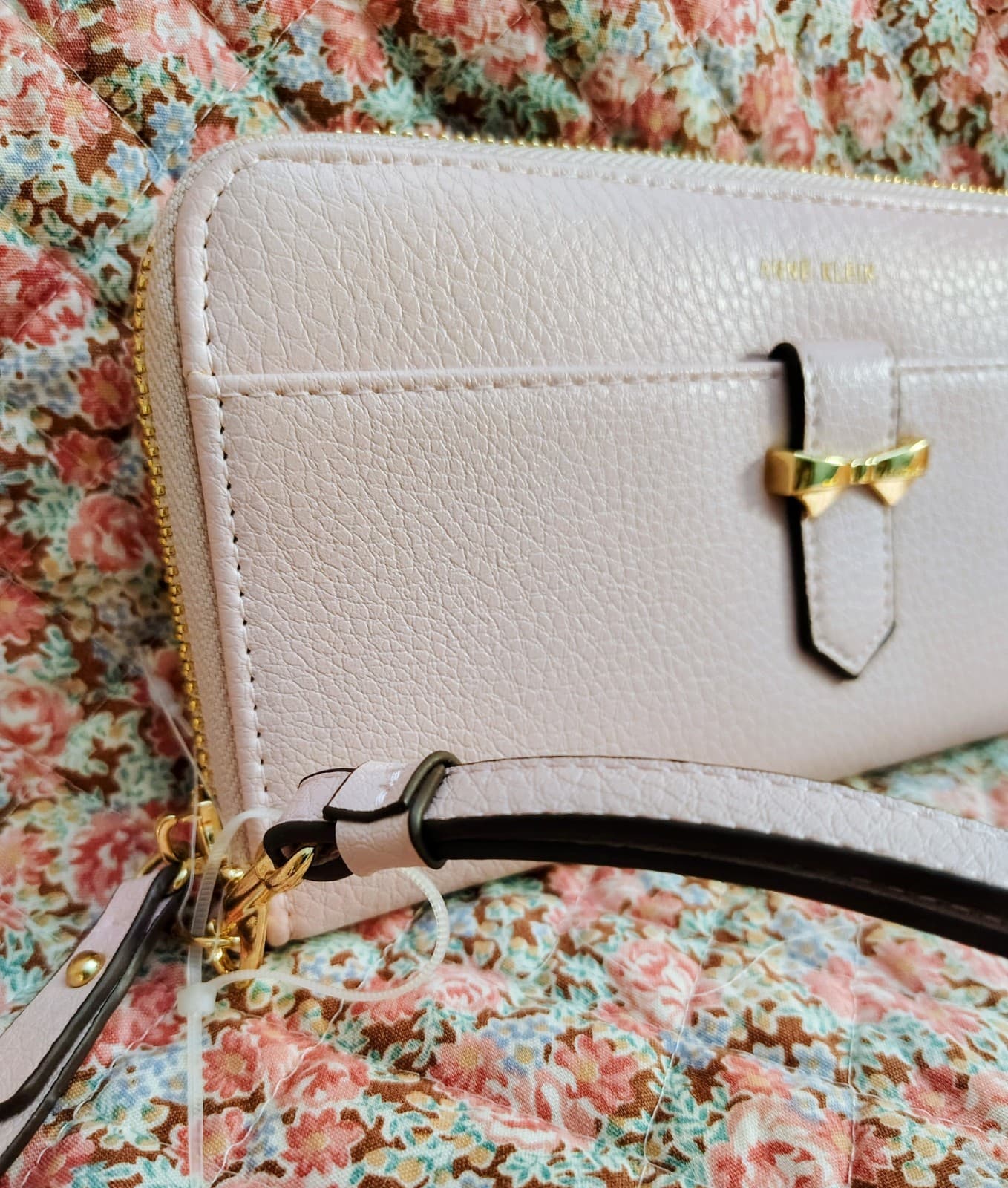 NWOT Anne Klein Pink Zip Around Pebbled Leather Wallet Gold Bow Buckle Wristlet