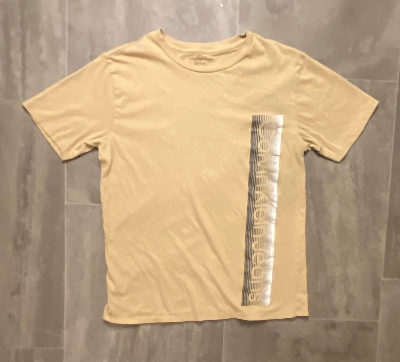 Tan Calvin Kline jeans tee shirt