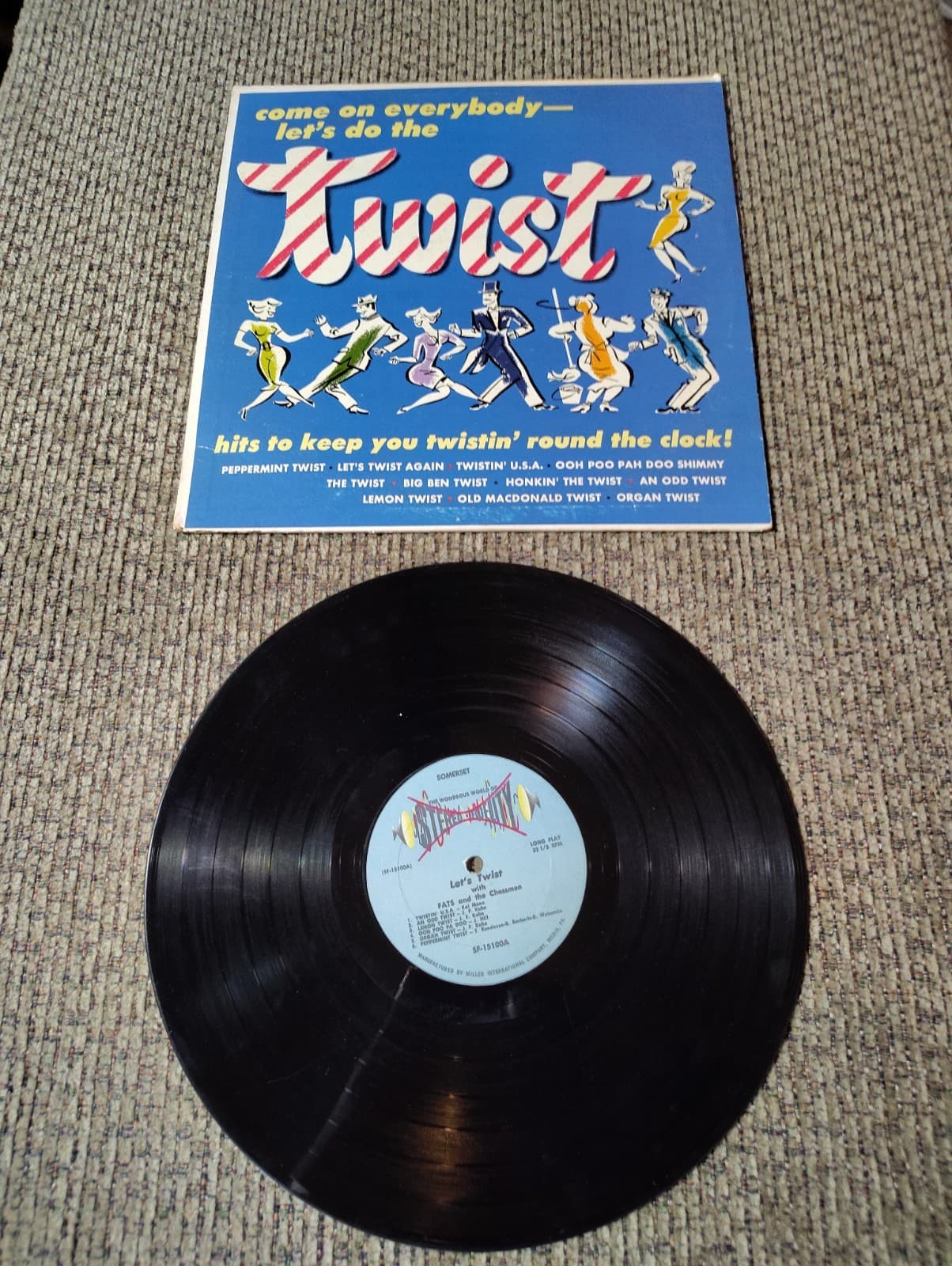 TWIST HITS TO KEEP YOU TWISTIN' ROUND THE CLOCK 33 RPM. LP. SF-15100