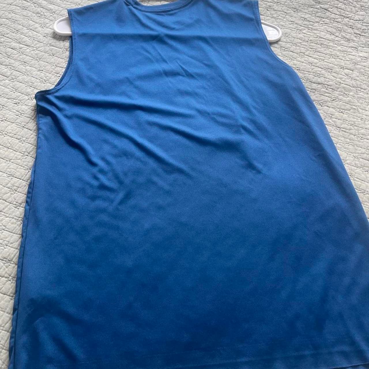 Stay cool during practice, workouts, or game day in this Athletic Works Boys Sleeveless Performance Tank Top. This royal blue athletic tank features a colorful sports graphic with baseball, softball, and other athletic silhouettes across the front, making it a fun choice for active kids. - Thumbnail 5