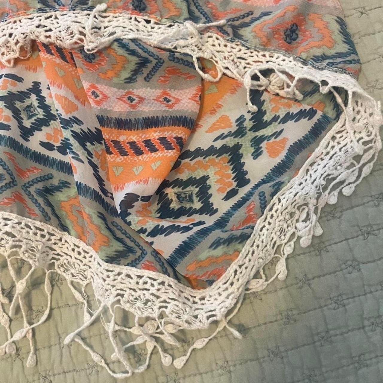 Orange, blue, and white geometric patterned poncho with crochet trim #boho #festival #poncho #cardigan - Thumbnail 3