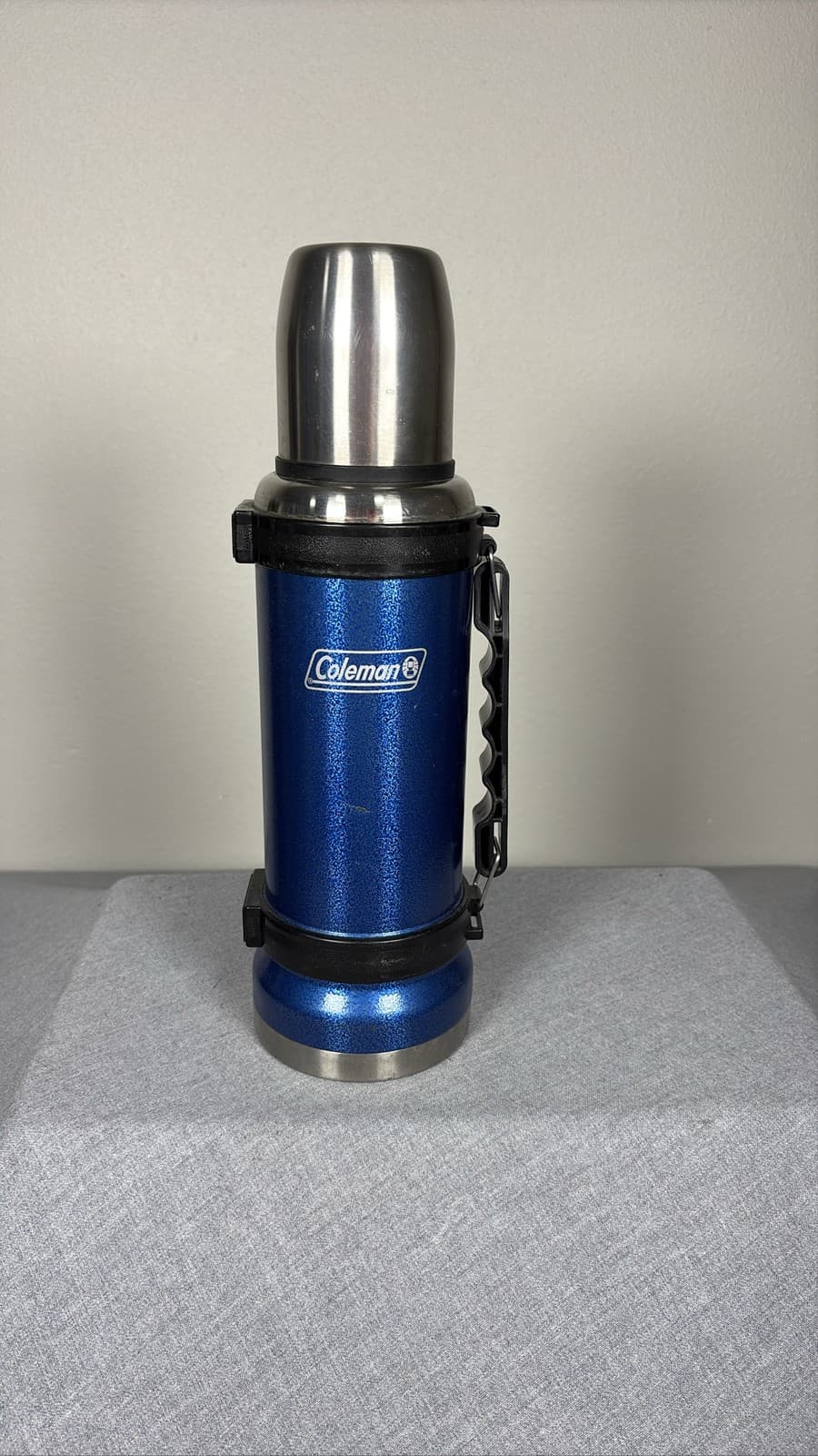 Coleman Stainless Steel Vacuum Insulated 1L Thermos Bottle with Blue Handle