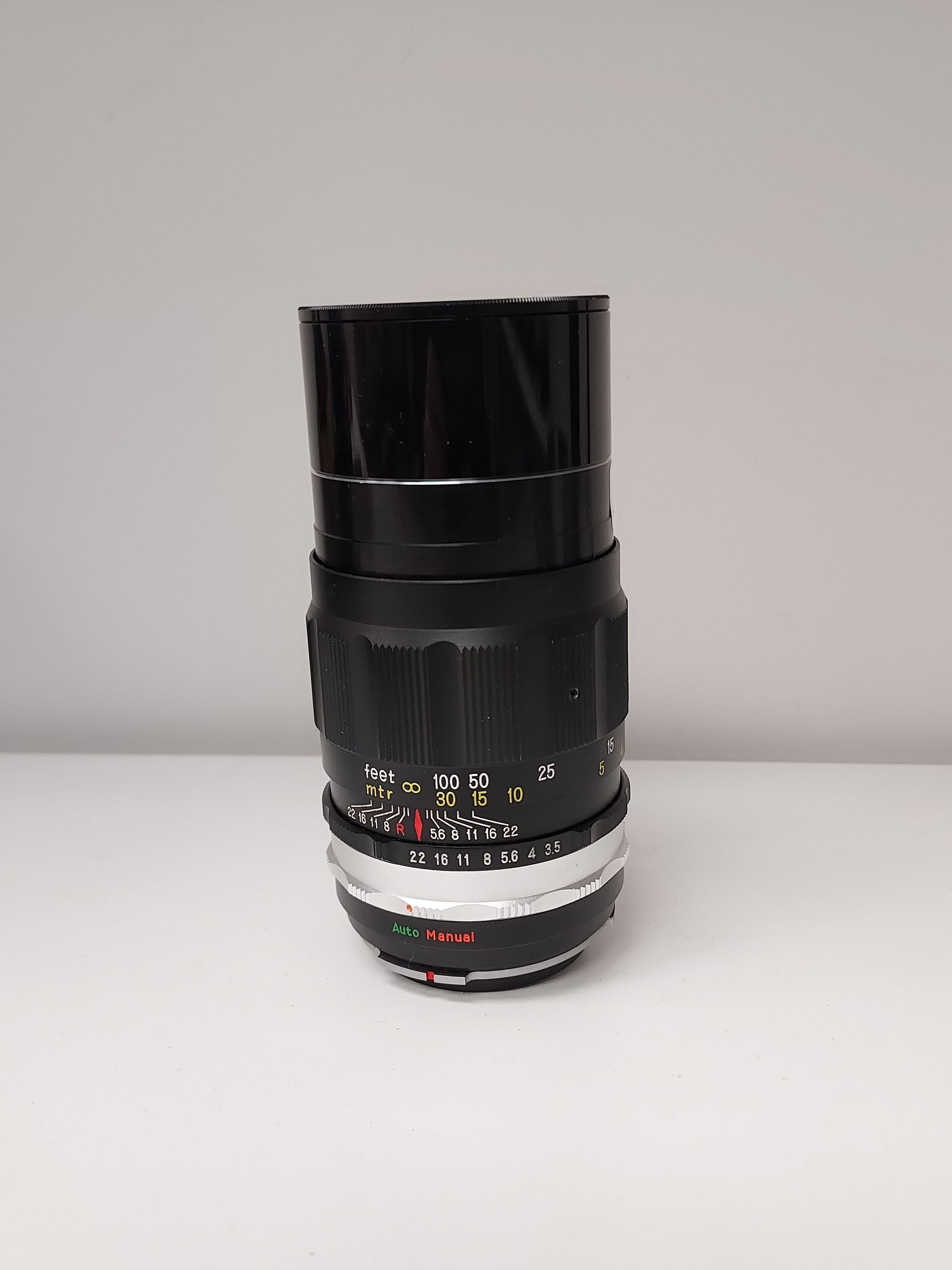 Petri C.C Auto 135mm f/3.5 Lens w/ Hood & SL39 UV Filter (52mm) #0390