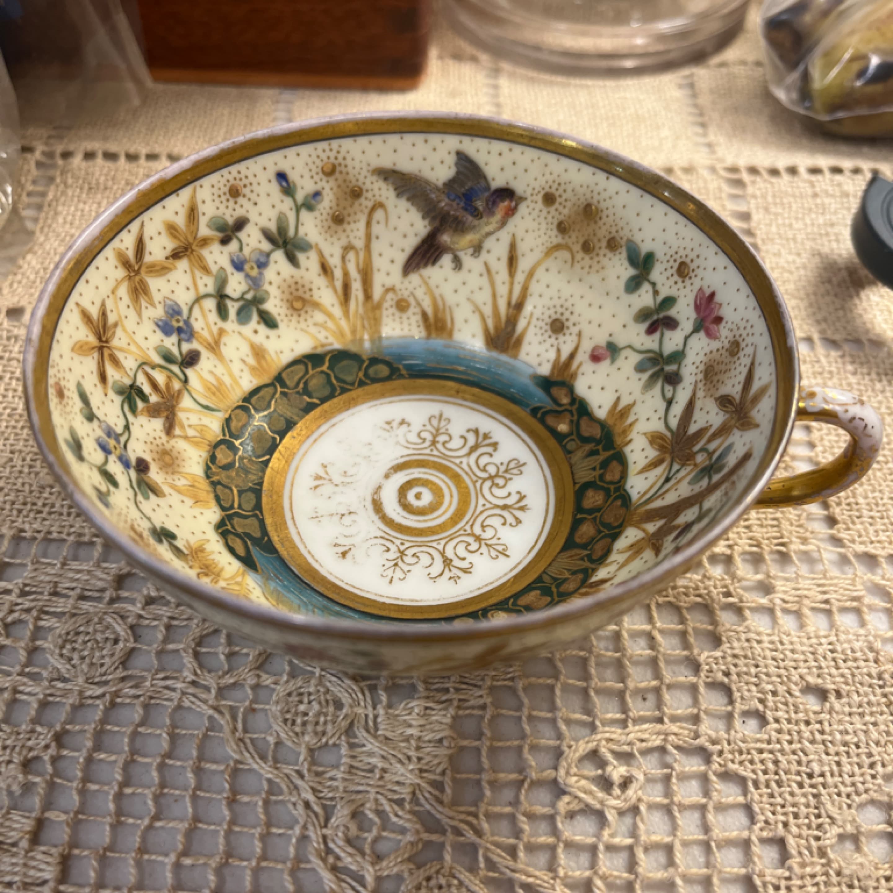 Hand-painted porcelain teacup with floral design and gold trim from Vienna. 941 - Regular