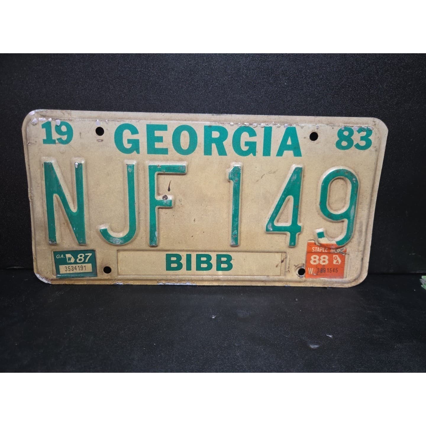 Georgia License Plate NJF 149, Bibb County, Green Cream 1988 Sticker, Vintage 83