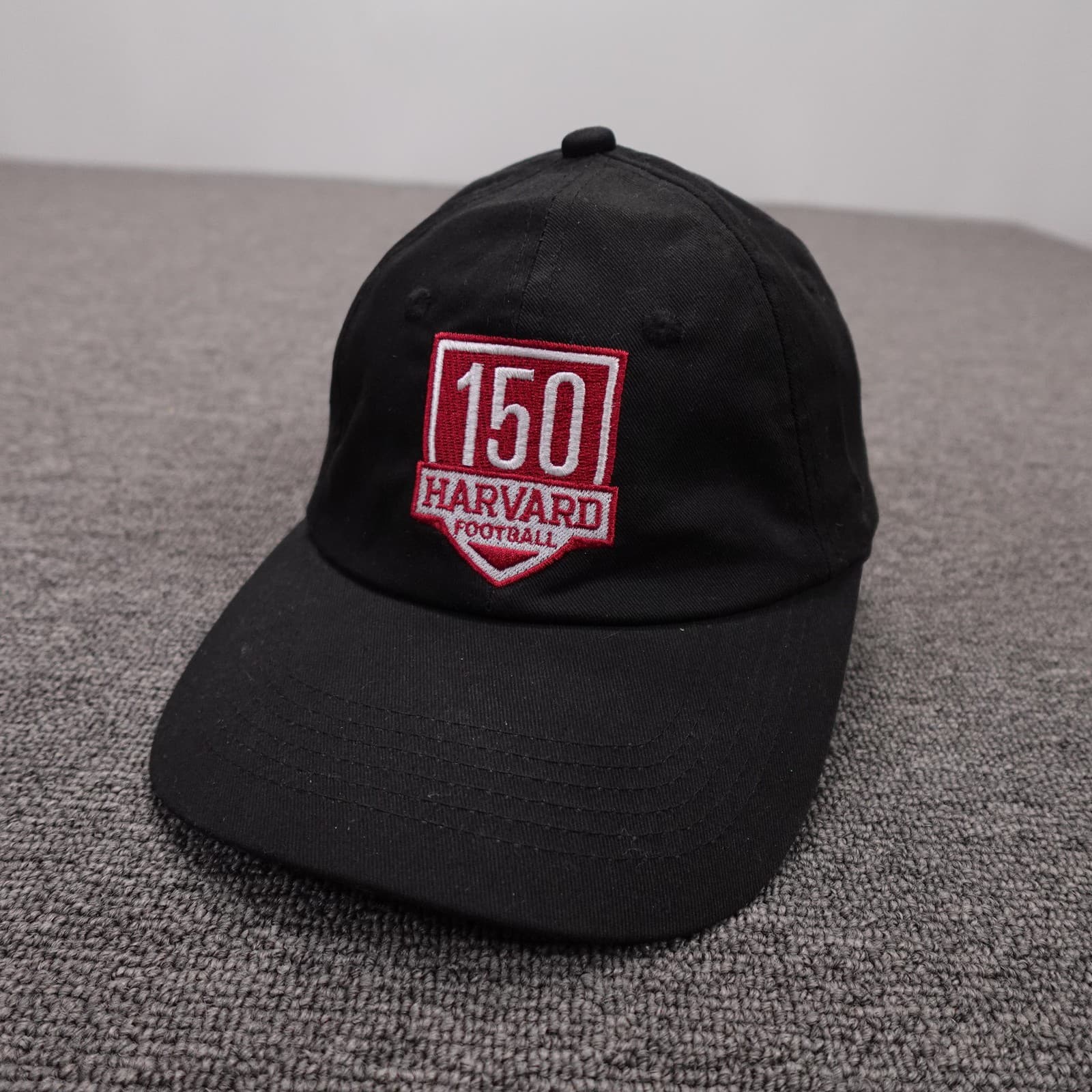 Harvard Crimson Hat Cap Strap Back Mens One Size Black NCAA Football 150 Shield