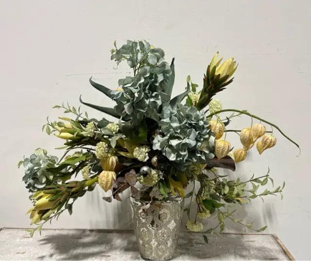 Floral Arrangement In Mercury Glass Vase