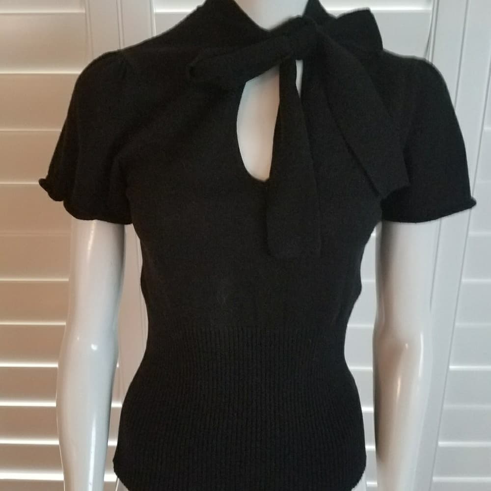 Lovely light weight short sleeve sweater.