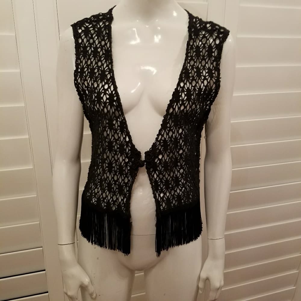 Delicate black knit vest