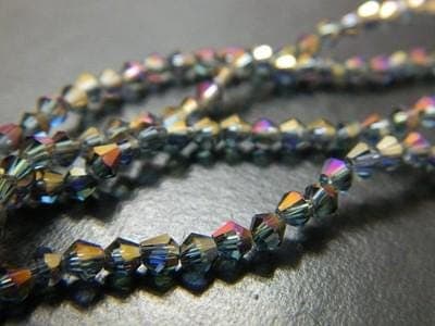 Golden Purple Bicone Beads: 3mm Faceted Glass Strand - Image 1
